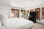Primary bedroom: King bed and a TV